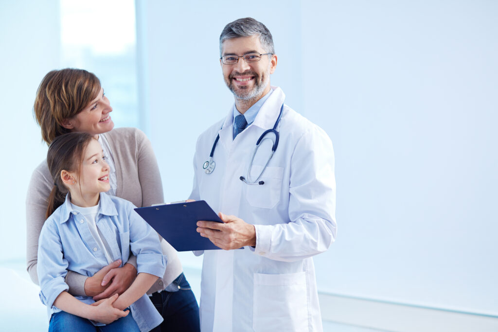 happy doctor holding clipboard with patients